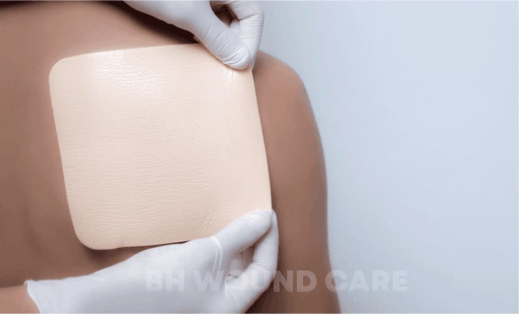 A doctor is applying bandages to a patient's back in Beverly Hills, CA, and Seattle, WA